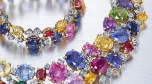 A close up of some colorful gemstones on a table A close up of some colorful gemstones on a table