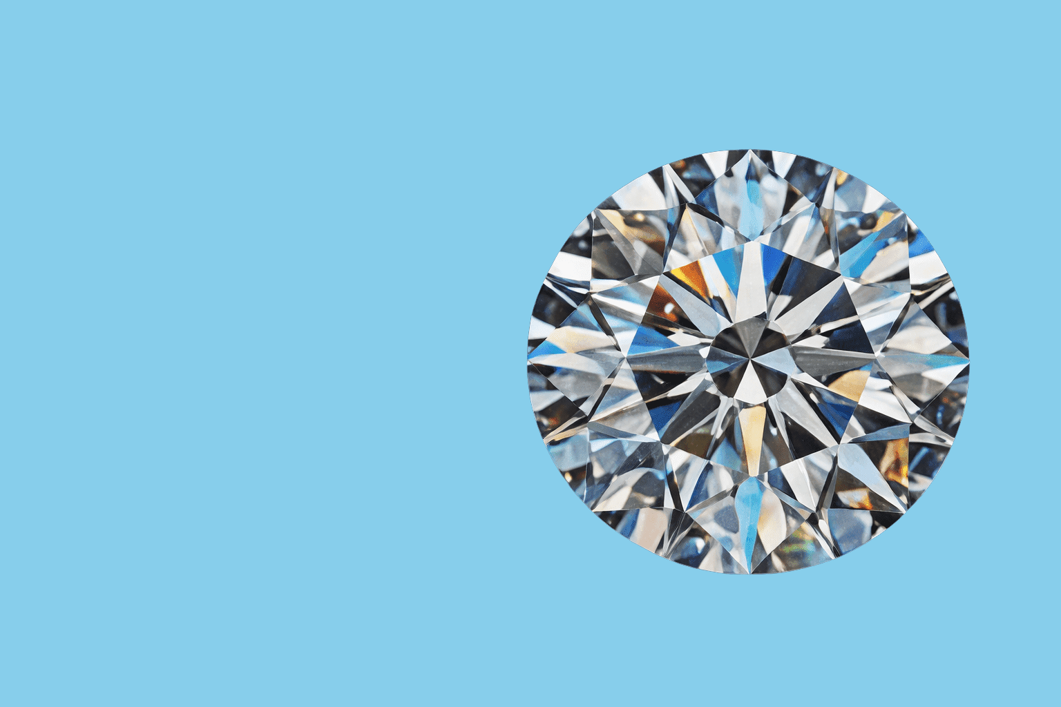 A sparkling round-cut diamond on a black surface.